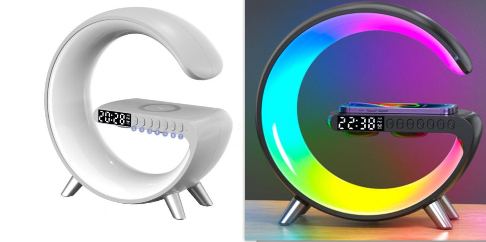 White and black G-shaped LED lamp with wireless charger, Bluetooth speaker, and digital clock for bedside use.