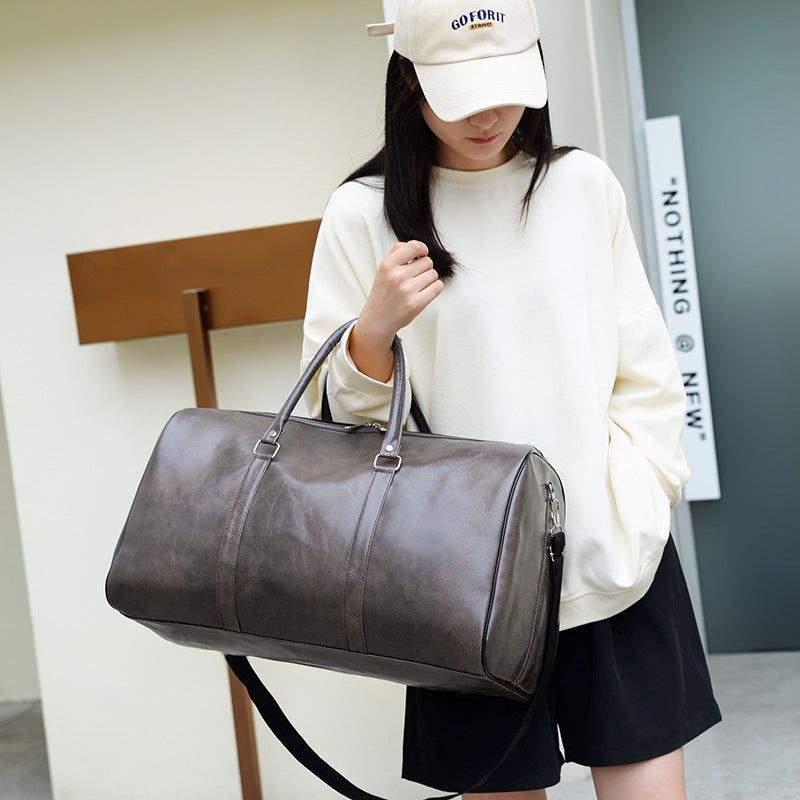 Polyurethane Leather Gym Bag with Soft Touch Finish and Structured Silhouette for Workouts and Travel