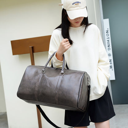 Polyurethane Leather Gym Bag with Soft Touch Finish and Structured Silhouette for Workouts and Travel