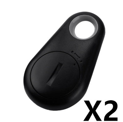 Two black teardrop-shaped waterproof bluetooth trackers for keys.
