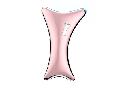 Pink and silver electric facial massager tool with ergonomic curved shape.