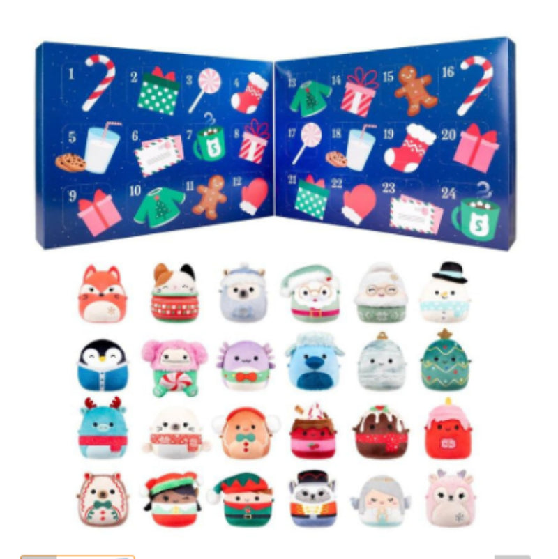Christmas advent calendar with numbered doors and 24 mini plush character toys laid out below.