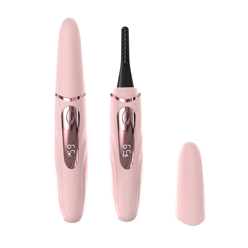 Pink heated eyelash curler with digital display and protective cap