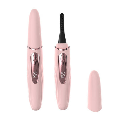 Pink heated eyelash curler with digital display and protective cap