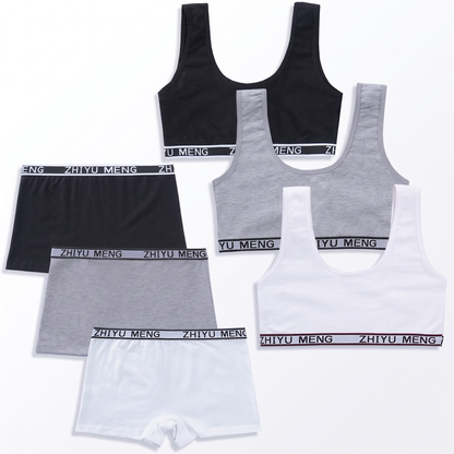 Three cotton briefs and three matching crop tops in black, gray, and white with logo waistbands.