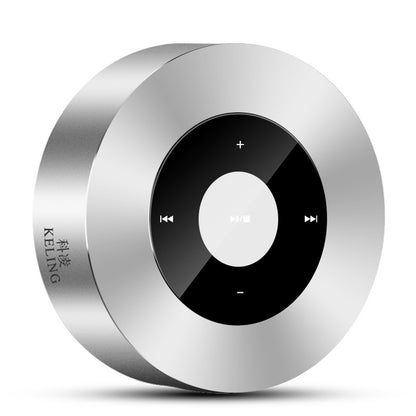 Round silver Bluetooth speaker with a central black control panel featuring playback buttons.