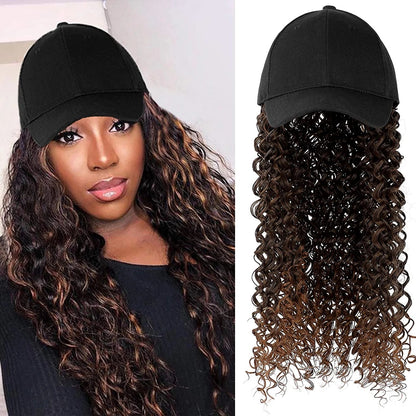 Black baseball cap attached to long brown curly hair, shown worn by a model and isolated on white.