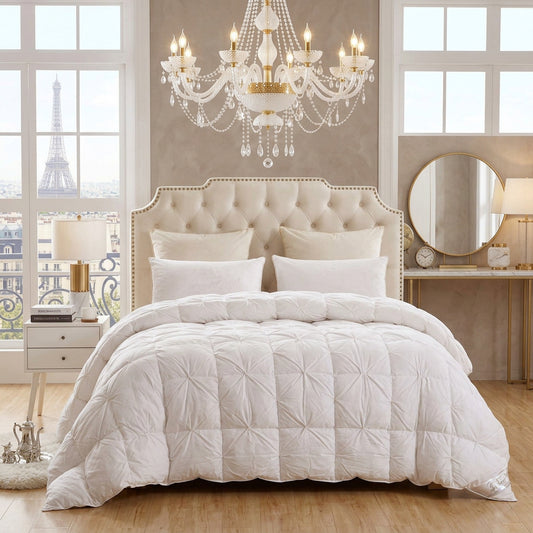 Down comforter with plush pinch pleat fill and cotton cover on a bed