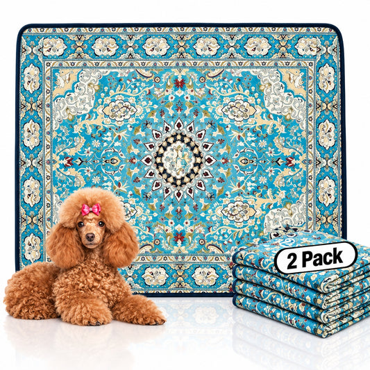 A fluffy brown poodle with a pink bow lies near a patterned blue dog pee pad, with a folded stack showing a 2 pack.