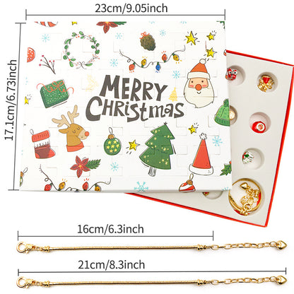 Christmas advent calendar box with holiday illustrations, open compartment showing charms, and two gold bracelets below.