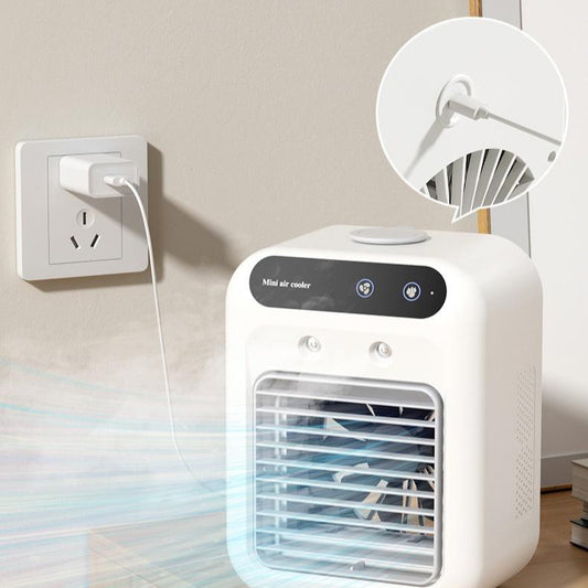 White mini air cooler plugged into wall outlet, with blue mist effects and inset showing the back power port connection.