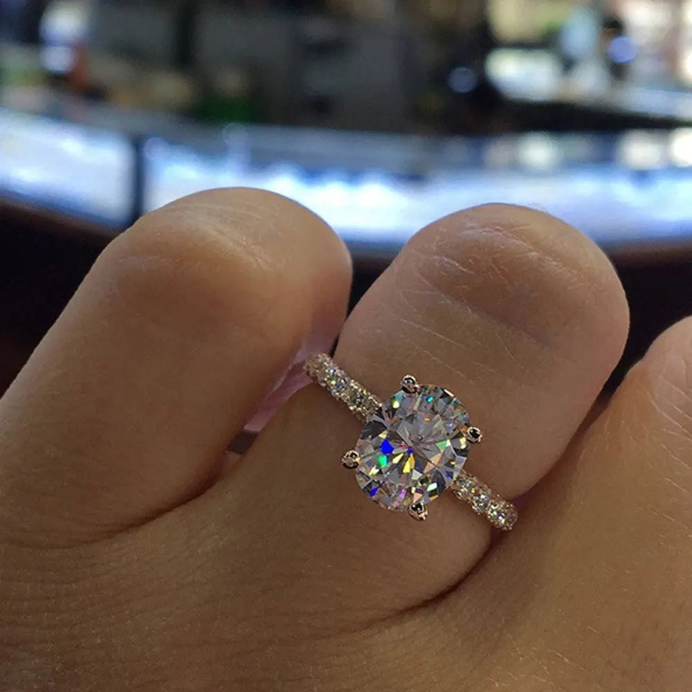 Oval Moissanite Ring with White Gold Plated Sterling Silver Band
