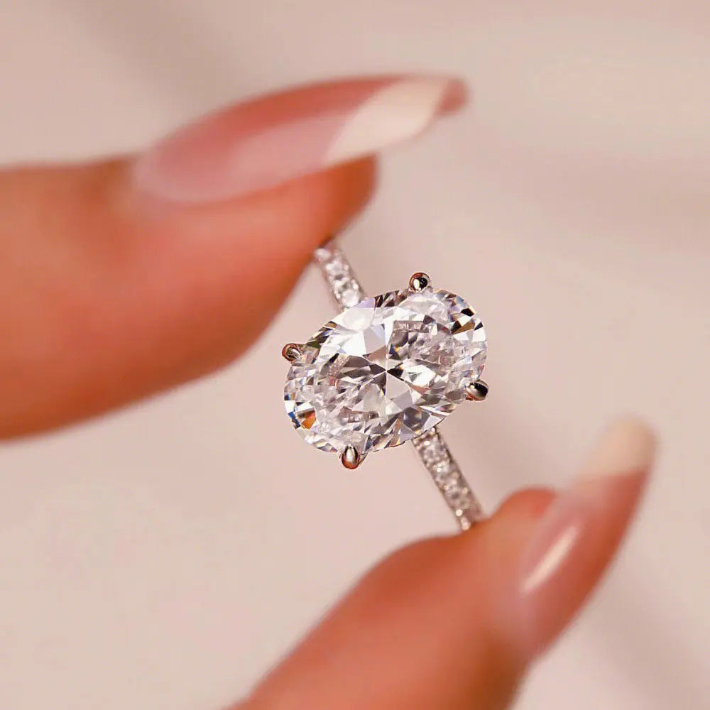 Oval Moissanite Ring with White Gold Plated Sterling Silver Band