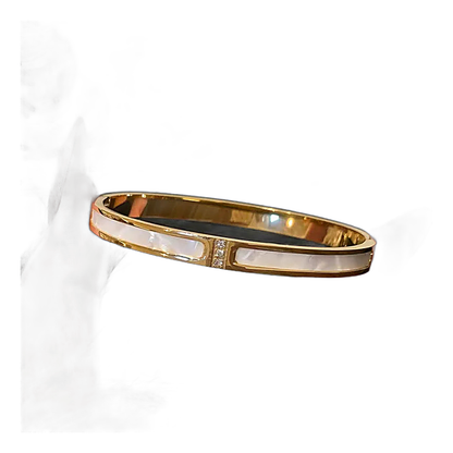 Close-up of rhinestone lines and mother-of-pearl inlay on the bangle stack, alternate view.