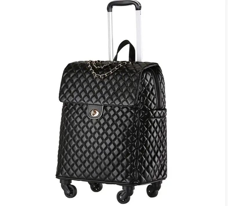 Black quilted PU leather rolling luggage with a top flap, gold turn-lock, chain detail, and telescoping handle.