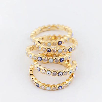 Adjustable Ring with Blue Evil Eye Open Copper Gold Tone Zircon Accent