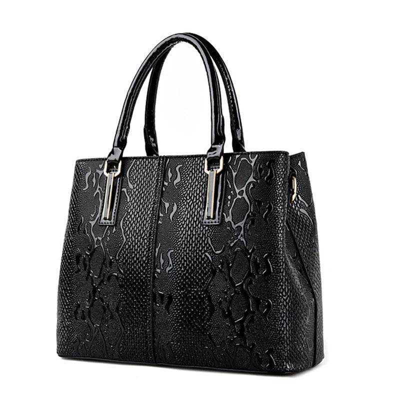 Black snakeskin textured faux leather structured shoulder tote for daily work essentials.