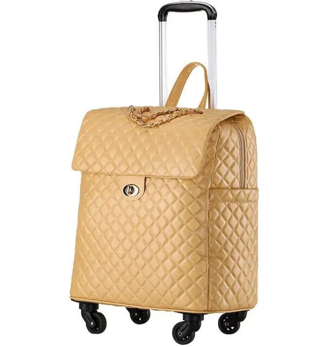 Beige quilted PU leather rolling luggage with gold chain detail, turn-lock closure, and telescoping handle.
