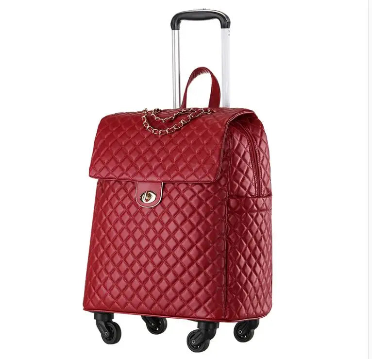 Red quilted PU leather rolling cabin trolley with gold chain accent, top handle, and retractable handle.
