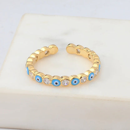Adjustable Ring with Blue Evil Eye Open Copper Gold Tone Zircon Accent