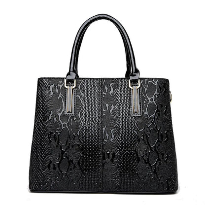 Black structured faux leather tote with textured animal print for daily essentials.