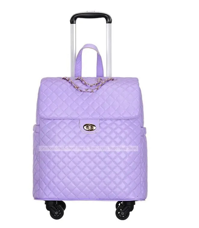 Lavender quilted PU leather rolling luggage bag with a gold turn-lock, chain accent, and telescopic handle.