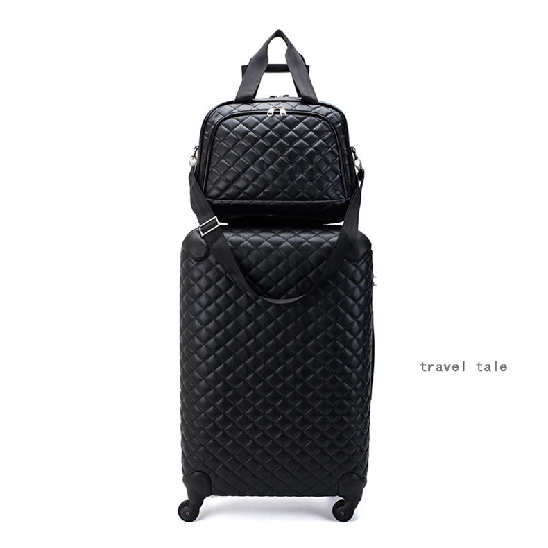 Black quilted faux leather spinner suitcase set with a matching travel bag on top.