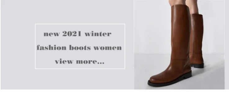 Brown leather knee-high boots with low heels and rounded toes.