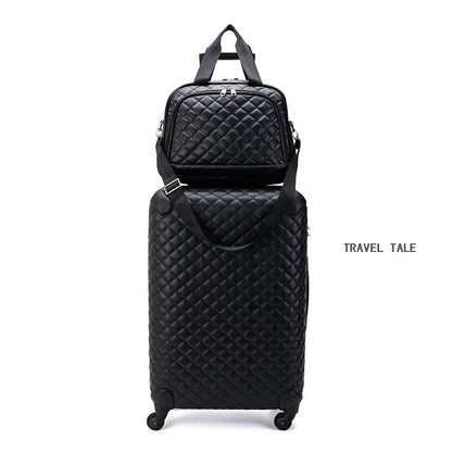 Black quilted leather luggage set with a spinner suitcase and matching travel bag.