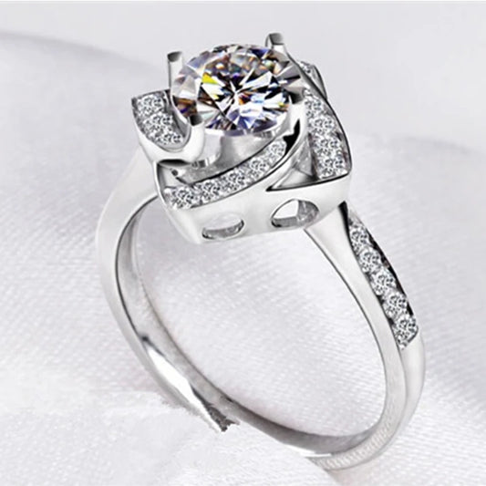 Close-up of crystal center stone in pave halo setting