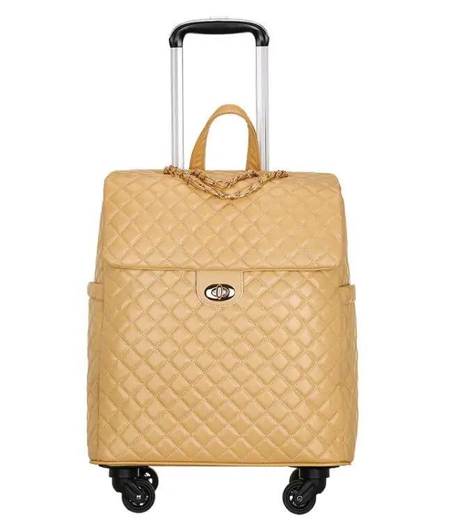 Yellow quilted PU leather rolling luggage with a top handle, retractable handle, twist-lock closure, and wheels.