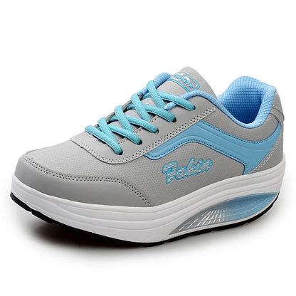 Women's lace-up rocker platform sneakers with cushioned sole