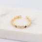 Adjustable Ring with Blue Evil Eye Open Copper Gold Tone Zircon Accent