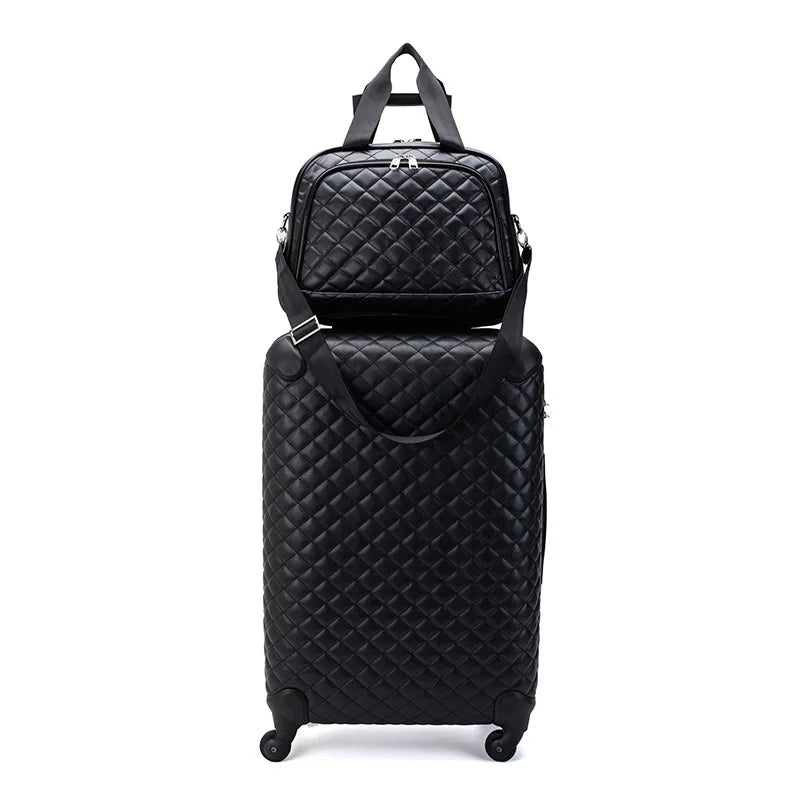 Black quilted leather luggage set with a spinner suitcase and matching travel bag on wheels.
