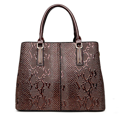Dark brown faux leather tote with snake-pattern texture and structured shape for daily organization.