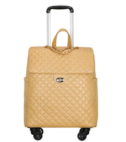 Yellow quilted PU leather wheeled luggage with gold chain handle, flap-over closure, and a telescoping handle.