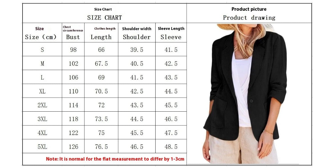 Size chart table alongside a woman wearing a black short sleeve suit jacket over a white top and tan pants.
