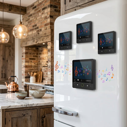 Black square music player magnets on a beige refrigerator.