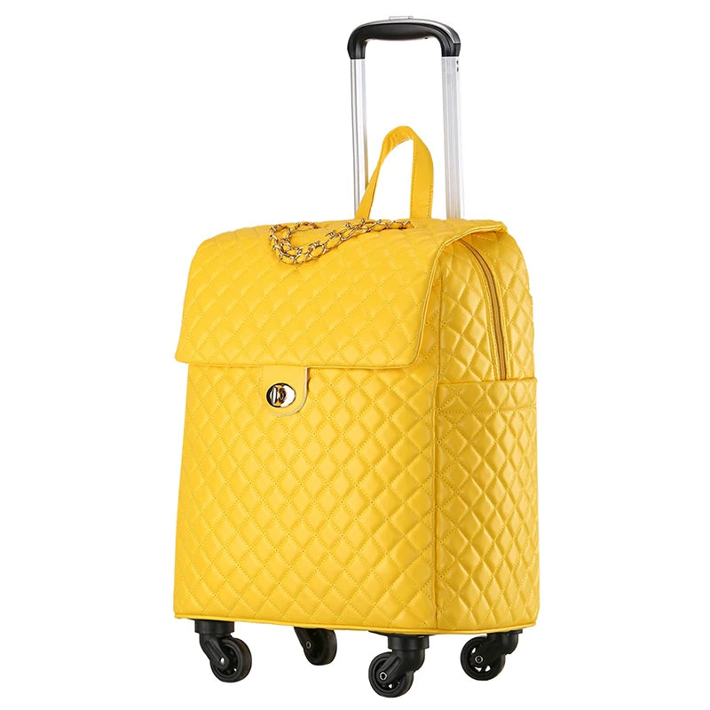Yellow quilted PU leather rolling luggage with a flap top, gold chain handle accent, and telescoping handle.