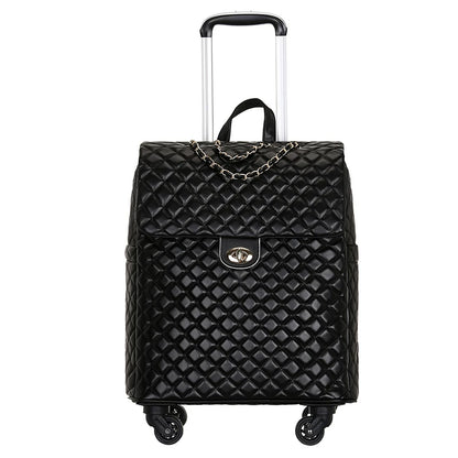 Black quilted PU leather rolling cabin trolley with gold chain accent, turn-lock closure, and telescoping handle.