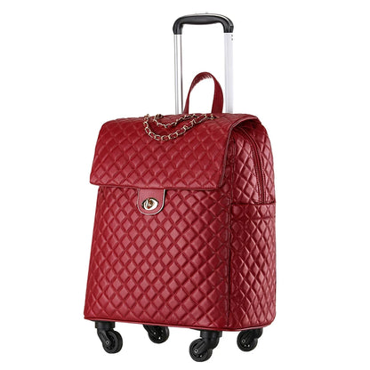 Red quilted PU leather rolling luggage with a gold chain accent, turn-lock closure, and telescoping handle.