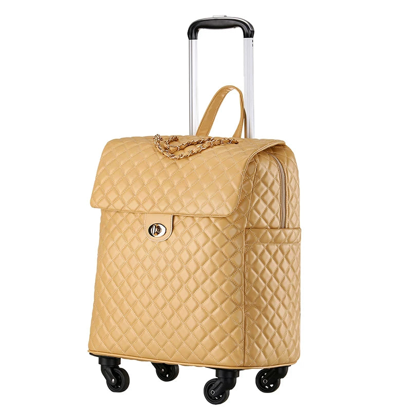 Beige quilted PU leather rolling luggage with gold chain detail, turn-lock closure, and telescoping handle.
