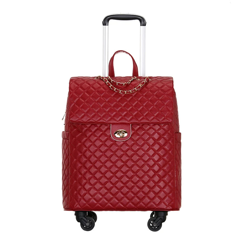 Red quilted PU leather rolling luggage with a gold chain accent, turn-lock closure, and telescoping handle.