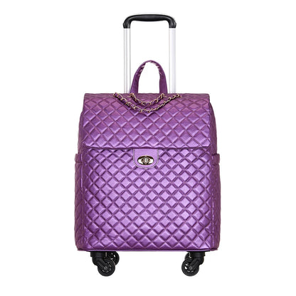 Purple quilted PU leather rolling cabin suitcase with a gold chain accent, turn-lock closure, and retractable handle.