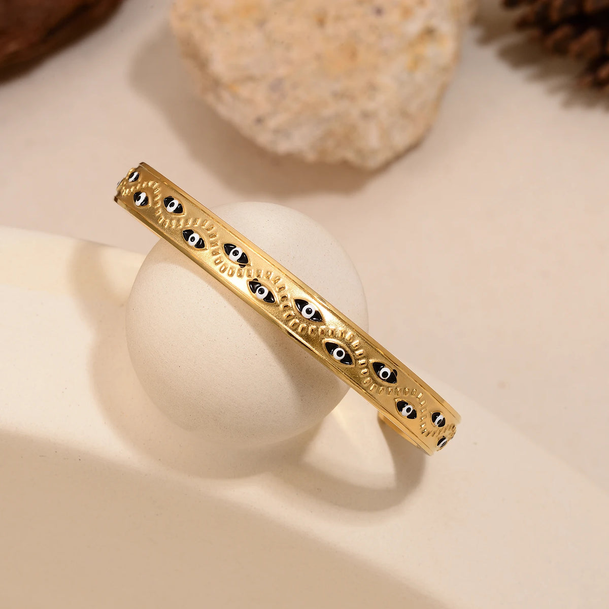 Women’s stainless steel cuff bracelet with an evil eye motif