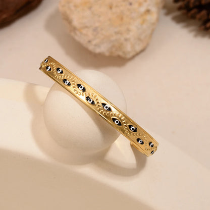 Women’s stainless steel cuff bracelet with an evil eye motif