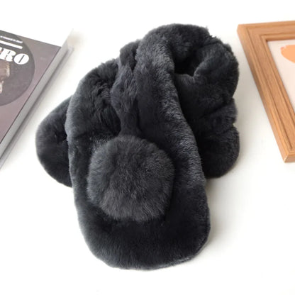 Dark gray faux fur short scarf with a thick triple-tube design and a matching pom-pom accent.