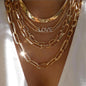 Women's Goldtone Necklace Set With Braided Bead Chains And Star Pendants In Five-Length Array