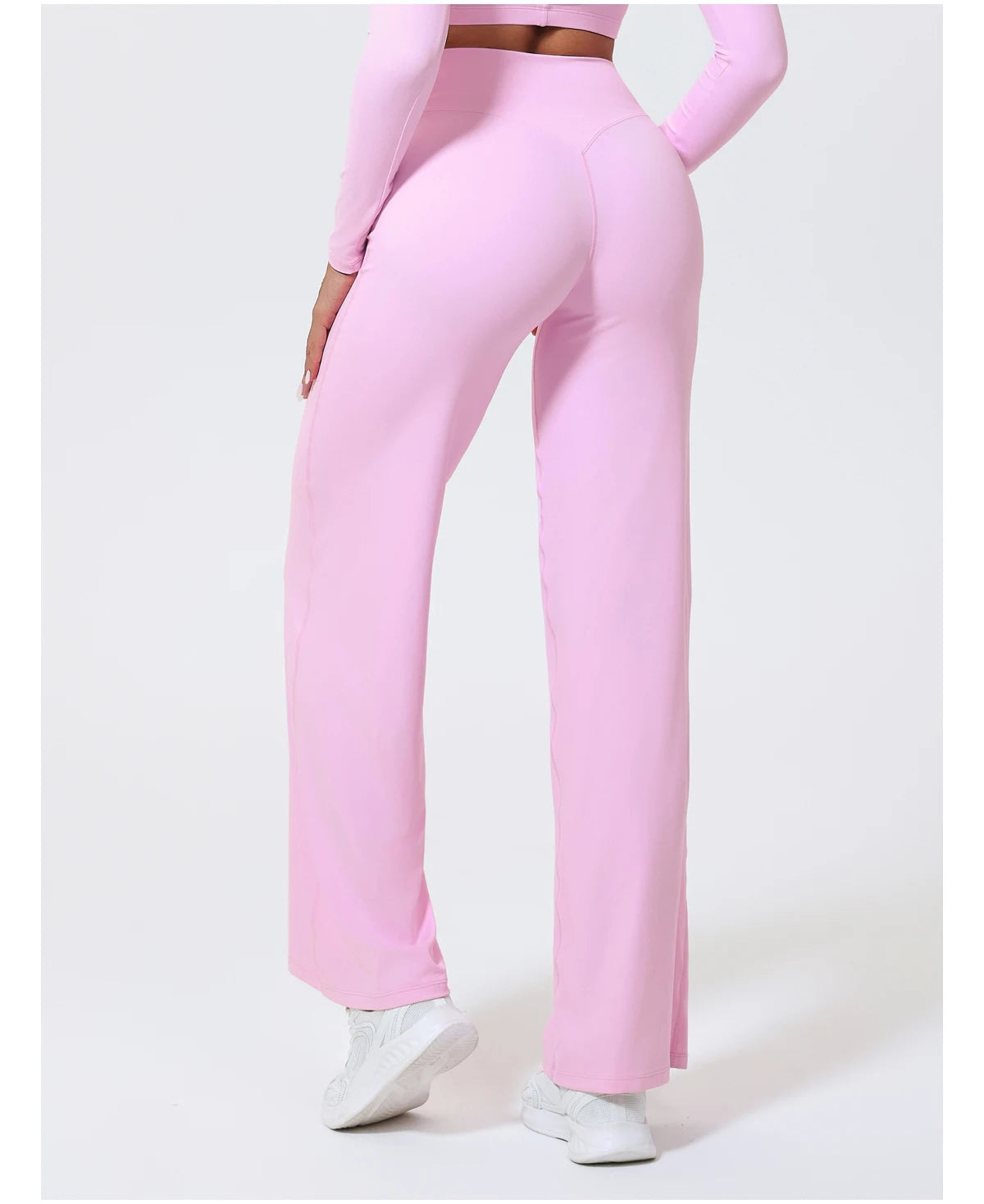 Light pink high waist sculpting leggings in stretchy, quick-dry knit for workout activities.