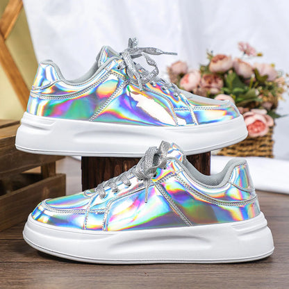 Holographic silver casual sneakers with thick white soles and sparkly silver laces.